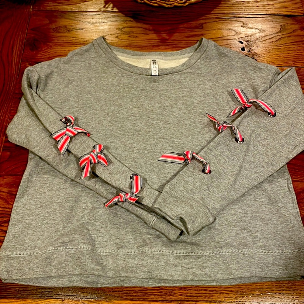 Boutique sweatshirt with bows on sleeves size large